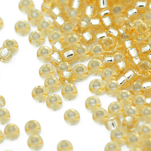 Miyuki Rocailles / gold silverlined / 11gr. Ø 1.5mm 15/0 