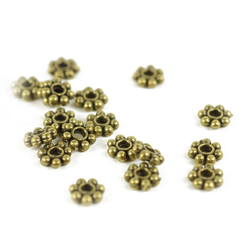 Blümchen Spacer / brass colored / Ø 6 mm