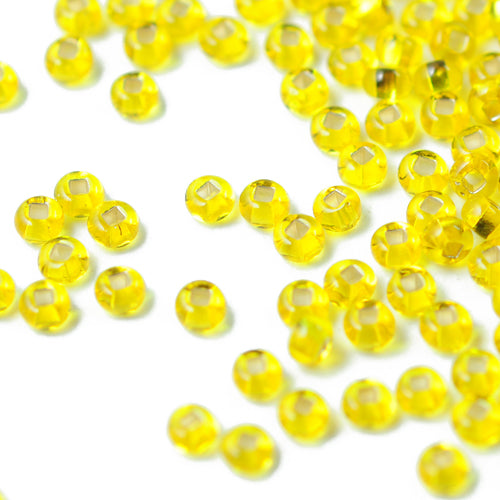 Preciosa Rocailles / yellow silver feed 9/0 / Ø 2.6mm / 15gr.