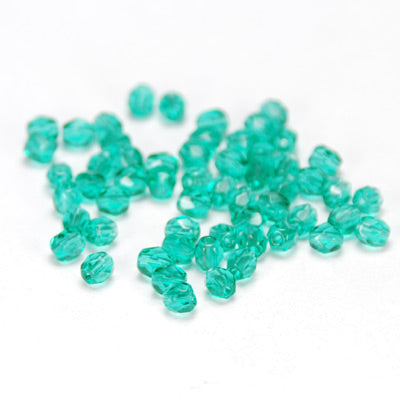 Preciosa ground glass beads / blue zircon / 100 pcs. / 4mm