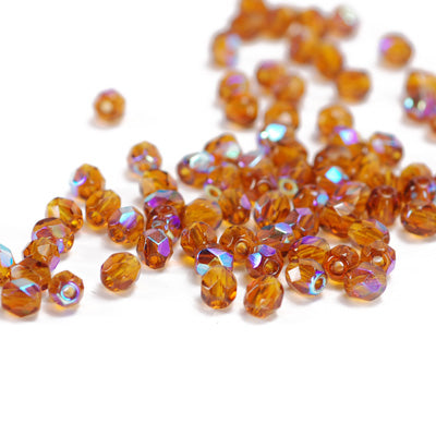 Preciosa ground glass beads / brown AB / 100 pcs. / 4mm