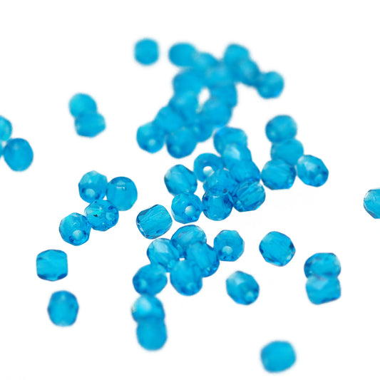 Preciosa ground glass beads caribean blue / 100 pcs. / 3mm